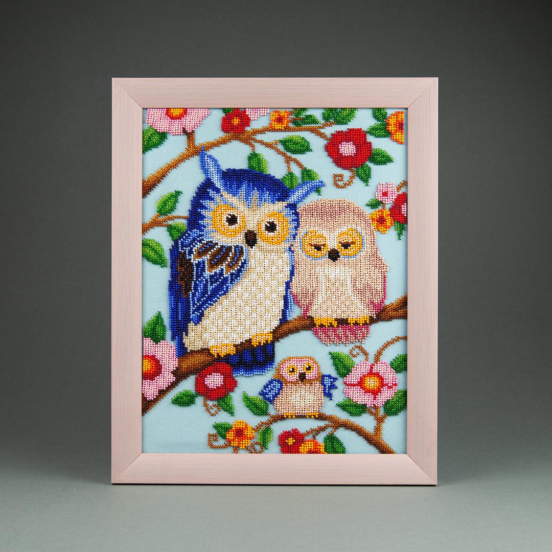 DIY beaded painting of a joyful family