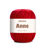 Red ball of yarn with a white label on a white background